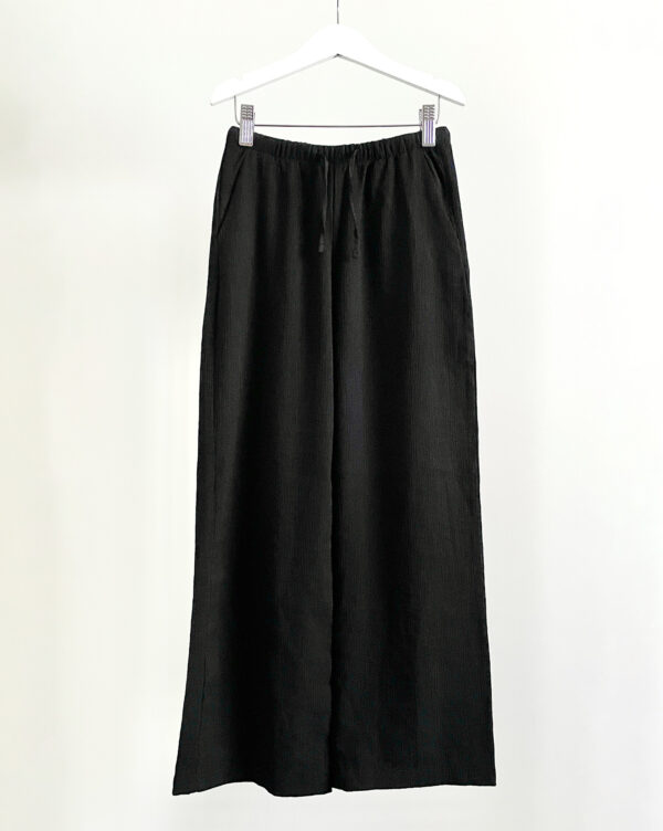 מכנסיים שחורים בגזרה רחבה לילדות H&M